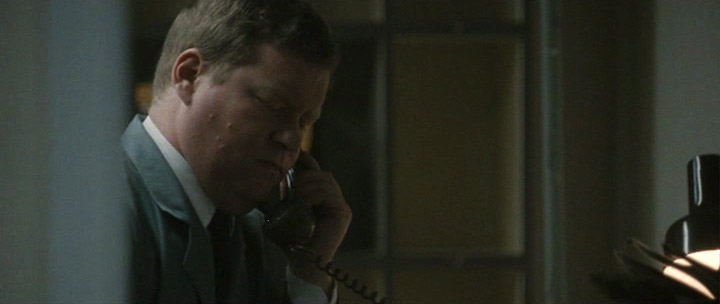 Fig. 3. Owen takes Mendel’s telephone call.