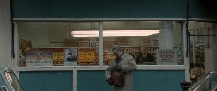 Fig. 22. Smiley buys a bottle of whiskey for Connie Sachs.