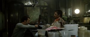 Fig. 4: Et andet eksempel fra Fight Club er dialogen fra den scene, hvor Tyler Durden ætser fortællerens hånd med lud: ”Tyler: This is your pain. This is your burning hand. It's right here. Look at it. /Fortælleren: I'm going to my cave. I'm going to my cave and I'm going to find my power animal./ Tyler: No! Don't deal with this the way those dead people do. Deal with it the way a living person does.” (mine understregninger)