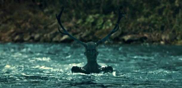 Fig. 11: The “stagman” and the raved-feathered stag are two nightmarish images about hunting that keep appearing in the show. Here Will is imagining fishing in a stream when he is interrupted by the stagman, symbolizing Lecter.