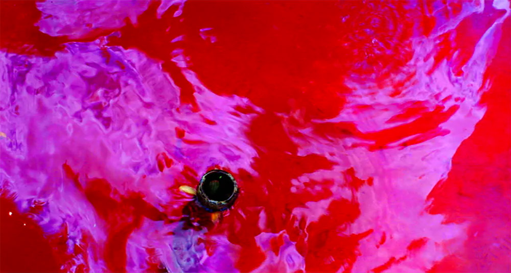 Fig. 7. The film frequently depicts rippling water, here mixed with blood.