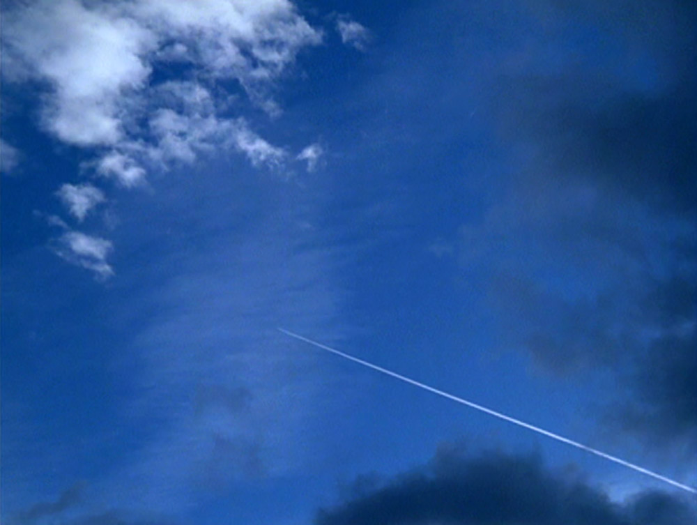 Fig. 2. A typical image of nature in Godard: the contrail of an airplane against a blue sky in Passion (1982).